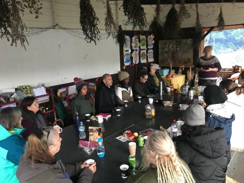 Winter Medicine workshop participants gathered inside the outdoor classroom at Laudato Si Centre 